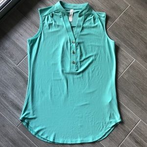 NWOT mint green sleeveless blouse